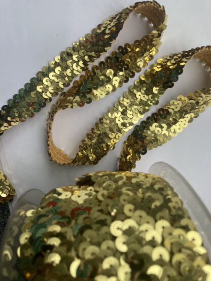 Gold Sequinned elasticated stretch Trim