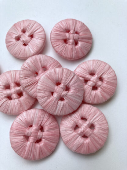 Pink raffia covered 4 hole button