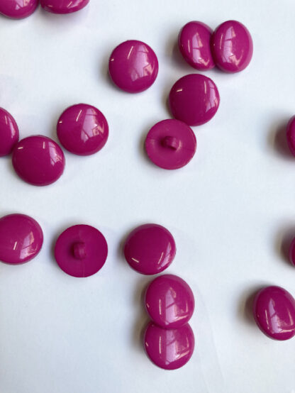 Magenta Pink smarties type shiny plastic domed shank button