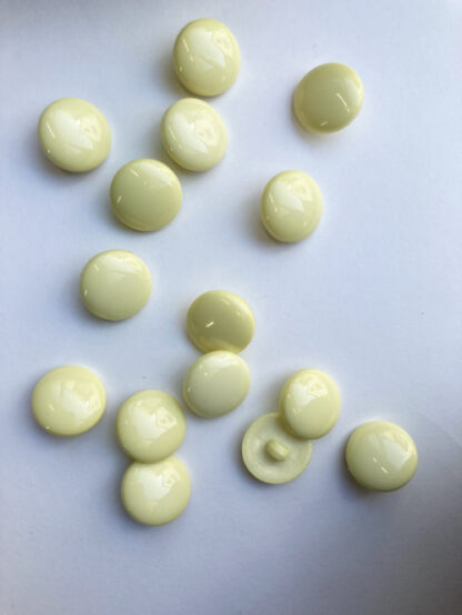 Lemon Yellow smarties type shiny plastic domed shank button