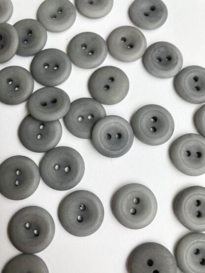 Mid Grey corozo nut 2 hole button with thumb dent