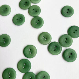 Grass Green corozo nut 2 hole button with thumb dent