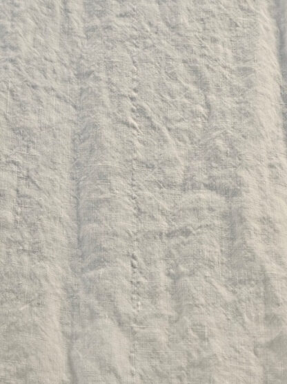 ivory washed irish linen with flaw running through centre (minor)