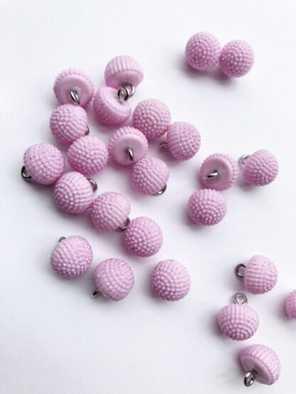 Pale Pink sparkly plastic dome button on shank