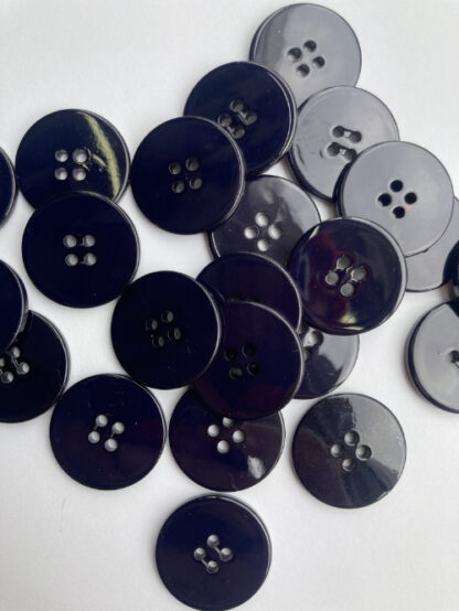 Black faux shell glossy plastic 2 hole flat button