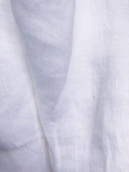 Optic White laundered lightweight super soft and buttery 150gsm shirting weight 100% Irish Linen. 