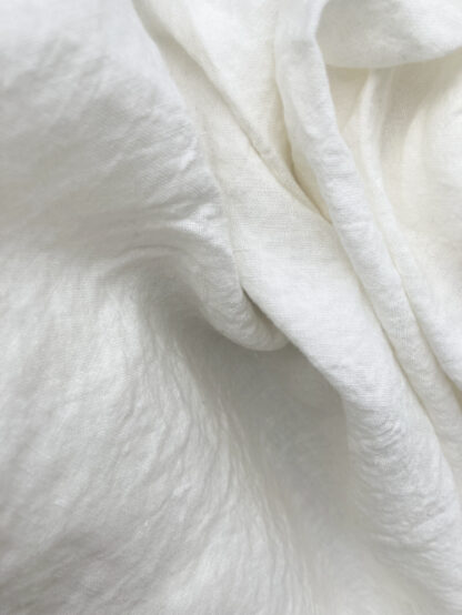 Ivory tumbled and laundered lightweight 185gsm 100% Irish Linen. 1/2 price due to flaw running through centre - minor and should be easy to work around. See extra image for detail and ask for advice if needed. 