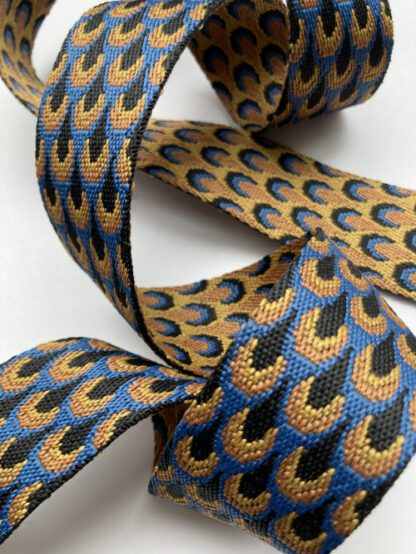 Mid Blue, Oche, Yellow and Black reversible peacock design 100% Polyester braided Webbing