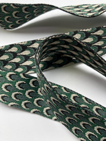 Bottle Green, Black and Ecru reversible peacock design 100% Polyester braided Webbing