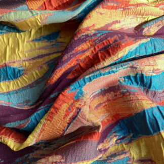 Red, Turquoise, Yellow, Purple Multicolour abstract design 98% Polyester 2% Elastane Cloqué Brocade Suiting (elastane content provides texture not stretch)
