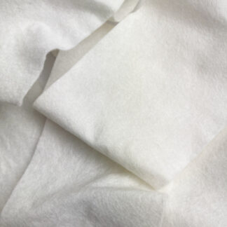Ivory 50% Wool 50% Viscose felted/ compressed natural fibre sew-in batting for quilted jackets and waistcoats. A natural alternative to Vilene's Thermolam