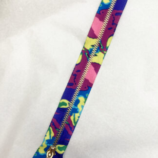 Psychedelic abstract rainbow purple, pink, lime printed fancy metal 7” zip