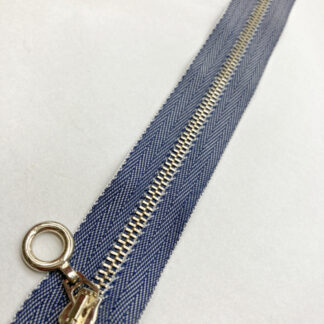 Denim jeans twill tape closed end zip with gold coloured metal teeth and ring puller. Suitable for pockets, pouches and bags
