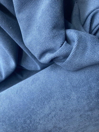 Denim mid Blue 93%  Polyester 5% Polyacrylic 2% Elastane stretch drapey/floppy skirt & dress weight Needlecord