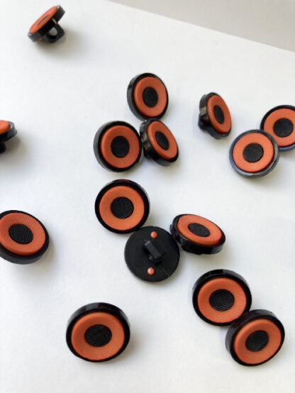 Orange and Black centre 'target', and rim moulded Plastic button on shank