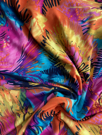 Fuchsia Pink, Orange, Magenta Purple and Yellow multicolour firework abstract floral print 95% Viscose 5% Elastane lightweight Jersey 75% stretch