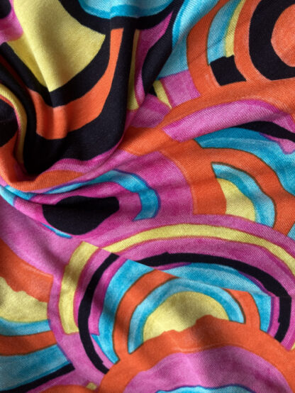 Fuchsia Pink, Orange, Yellow and Jade Green multicolour circles geometric print 95% Viscose 5% Elastane lightweight Jersey 75% stretch