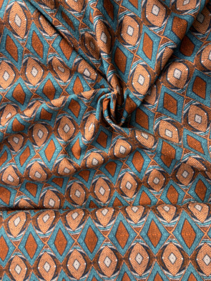 Terracotta and Turquoise Indonesian tribal geo print 100% Cotton Seersucker Piqué