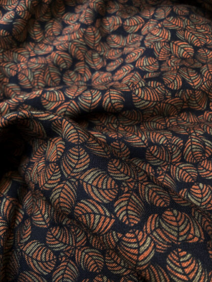 Tan Brown, Olive Green and Black small leaf print 55% Polyester 45% Viscose Ponte Roma floppy Jersey