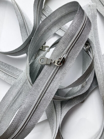 Metallic Silver heavy duty coil tooth continuous zipping (1 puller every 50cm)