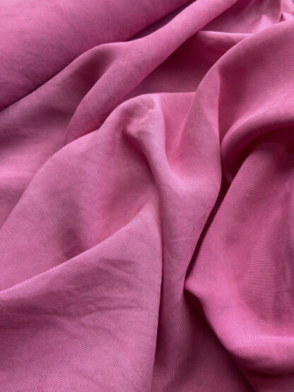 Candy Fuchsia Pink washed 100% Silk Piqué Crepe with very subtle geometric polka dot in 1m panels (sold per metre, but let us know if you would like whole panels)