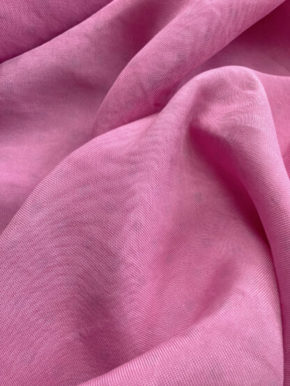 Candy Fuchsia Pink washed 100% Silk Piqué Crepe with very subtle geometric polka dot in 1m panels (sold per metre, but let us know if you would like whole panels)