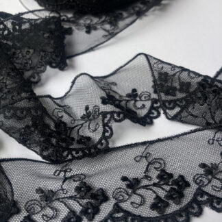 black spriggy floral design scalloped soft lace
