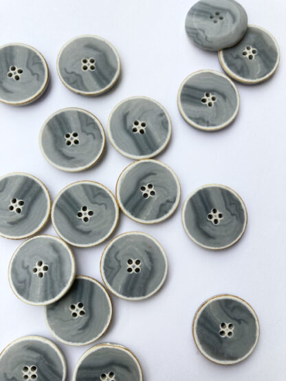 Light Grey marbled four hole matt plastic flat button