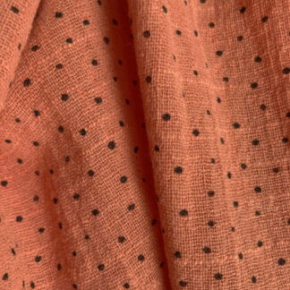 Pumpkin Orange  with black small irregular spots 100% Cotton Cheesecloth